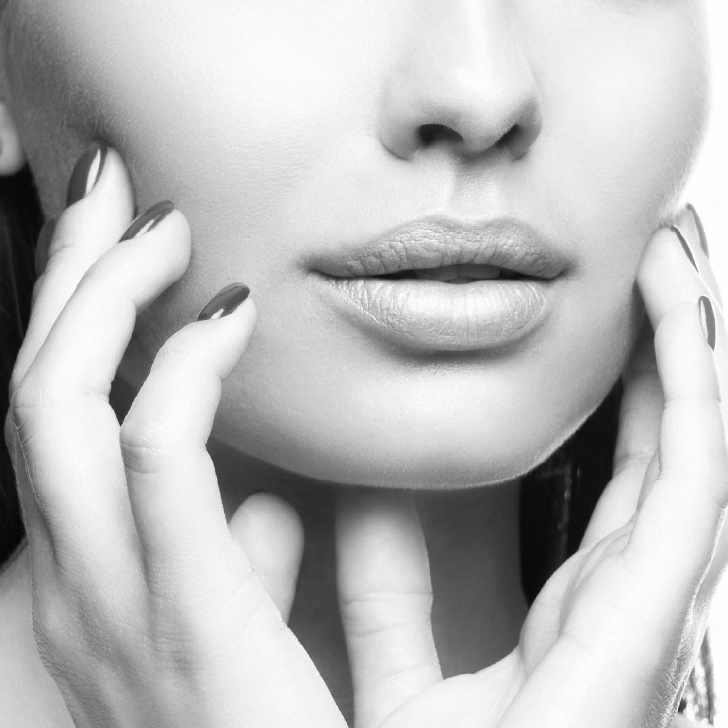 Close-up of a woman's lower face and lips showing smooth, natural results after filler treatment